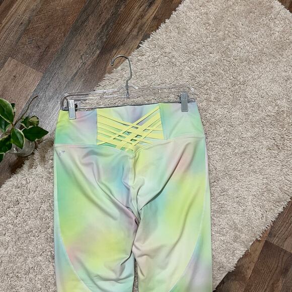 Fabletics Tie Dye Blur/Lemon Creme Boost Powerhold High Waisted 7/8 Leggings - Picture 5 of 9